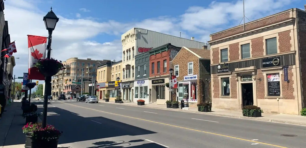 Downtown Aurora streetscape with Canadian flags